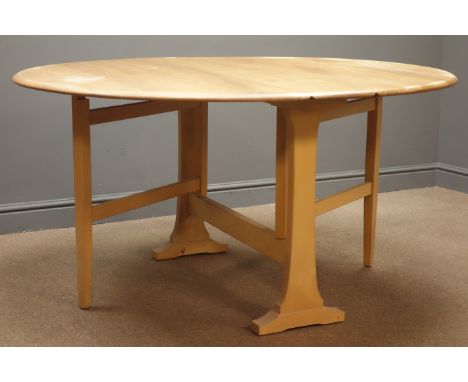 Ercol oval gate action drop leaf dining table, solid end supports on sledge feet, 128cm x 140cm, H72cm