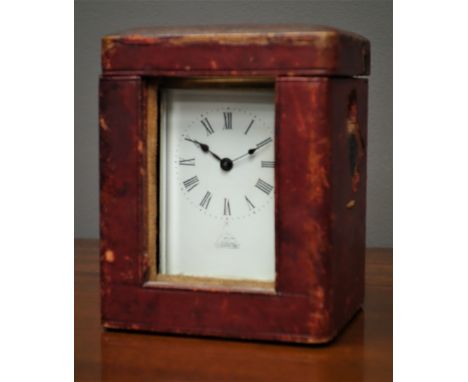 Early 20th century brass carriage clock in leather travelling case
