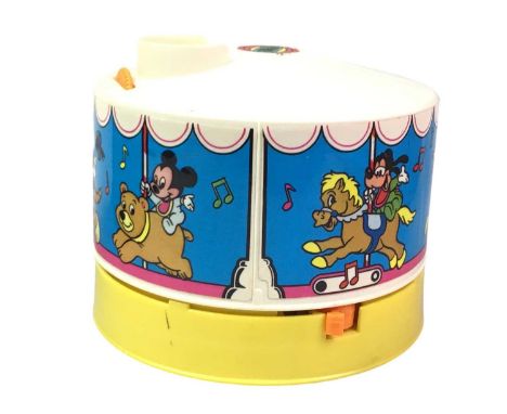 DISNEY DREAMTIME CAROUSEL, AND OTHER ITEMS along with other items including a novelty clock, a light up yoyo and further