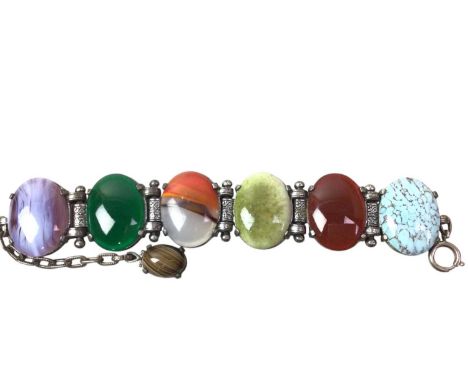 FLORAL BROOCH, IN NINE CARAT GOLD  set with seed pearls, along with a silver bangle and a group of costume jewellery includin