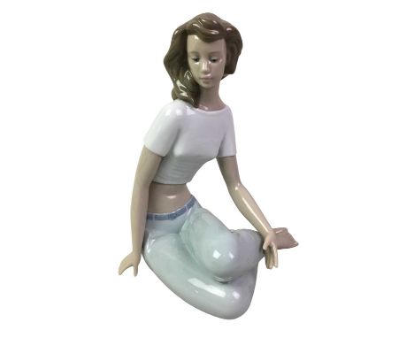 FOUR NAO FIGURES, comprising two seated females and two smaller standing figurestallest 26cm highQty: 4