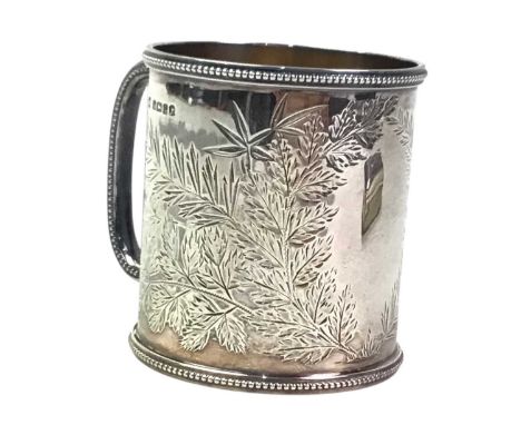 SILVER CHRISTENING MUG, SHEFFIELD 1878 engraved within beaded borders, along with a silver cigarette case (2) Qty: 180 grams