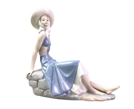 NAO FIGURE, AND A CAPODIMONTE FIGURE  the Nao figure of a young lady seated with hat30cm highQty: 2
