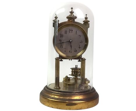 GUSTAN BECKER MEDAILLE D'OR ANNIVERSARY CLOCK, AND A MAHOGANY WALL BAROMETER  the anniversary clock under a glass domeclock 3