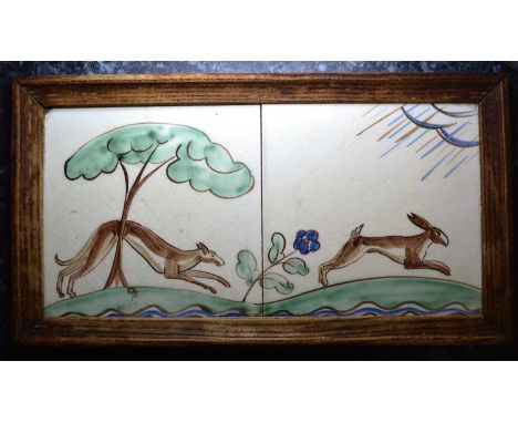 PACKARD & ORD, OAK FRAMED TWO TILE PANEL DISPLAY, EARLY 20TH CENTURY hand painted with a stylised hound chasing a hare over a