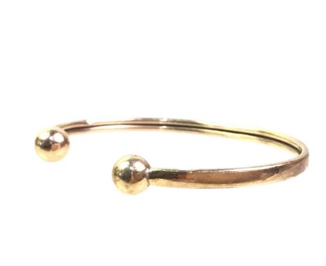 GOLD TORQUE BANGLE, marked for nine carat gold6cm wideQty: 5.37g