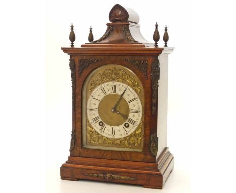 A walnut veneered mantle clock with eight day movement striking on a double gong We cannot do condition reports for this sale