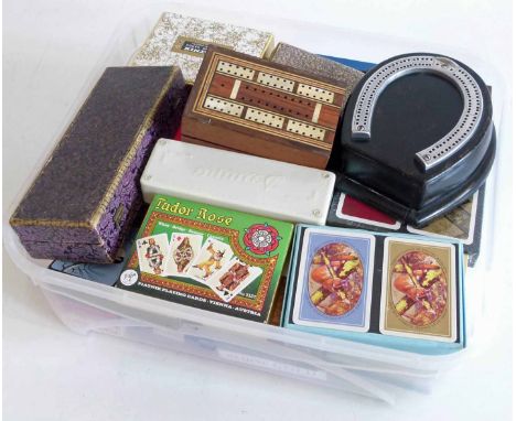 An assortment selection of playing cards, cigarette cards, dominoes and various games We cannot do condition reports for this