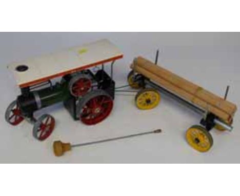 Mamod steam tractor and timber trailer. We cannot do condition reports for this sale.