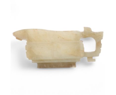 A Chinese pale green/brown jade Archaistic style pouring vessel, length 12cm