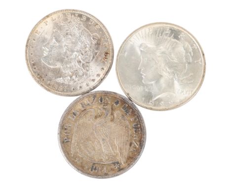 2 United States silver Dollars 1887 &amp; 1922 (26.8g) each together with an 1884 Chile 1 Peso (25g)