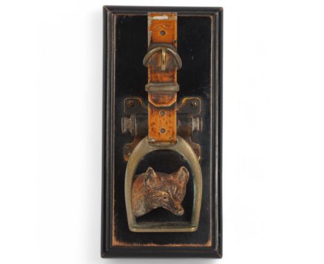 A 19th century cold painted bronze fox and stirrup design desk clip, on ebonised base, no factory marks, base length 15.5cmLi