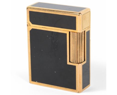Dupont gold plate and black lacquer pocket lighter, height 4.5cm