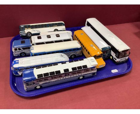 Nine Diecast Model Buses by Corgi, MTH, Norev and other. All with an American theme and mostly with Greyhound liveries, small