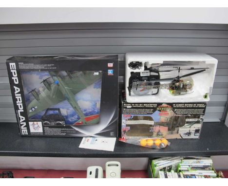 Two Modern Radio Controlled (R/C) Flying Models comprising of a Twister Medevac Bell Helicopter and Wen Xiang EPP Airplane, b