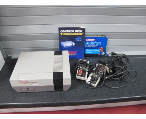 A Nintendo Entertainment System NES Version Games Console, Two Controllers, Instruction Booklet (Untested for working order).