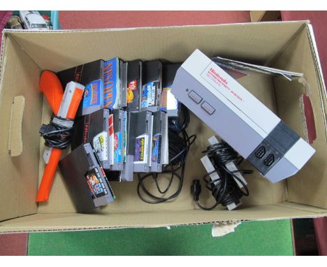 Retro Gaming Technology : A circa 1985 Nintendo Entertainment System NES Gaming Console (Model No. NESE-001 GBR), Two Hand He