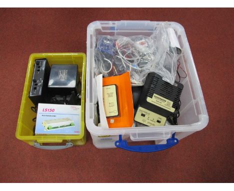 Two Plastic Tubs, containing a quantity of mainly unboxed control units and accessories, to include items by Gaugemaster (Com