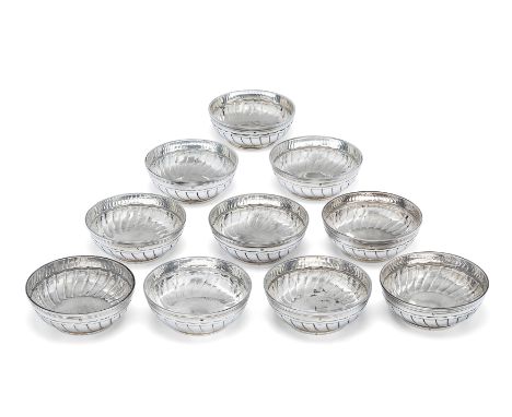  A set of ten French silver finger bowls. Emile Puiforcat, Paris, 20th century.The circular bowls designed with fluted sides 