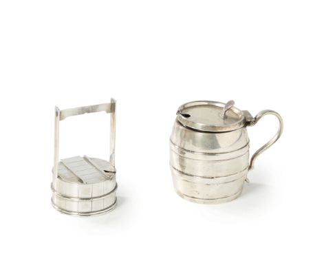 A novelty silver salt cellar designed as a well.Stamped sterling. 20th century.The circular well realistically decorated to r