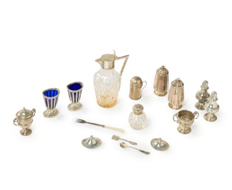 A group of silver including a pair of pepper shakers.John Tapley, London, 1841. Of fluted design, engraved with crests and ra