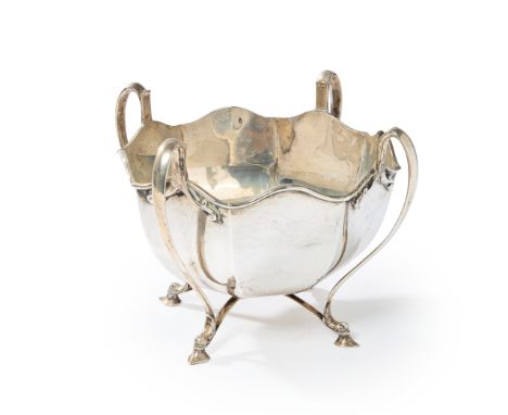A George V silver rose bowl. William Hutton & Sons,Sheffield, 1910. Of octagonal form and raised on four pad feet, the elonga