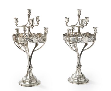 A pair of Art Nouveau silver candelabra. Probably German, c.1900. The candelabra stamped 900M, possibly for Gustav Memmer, Be