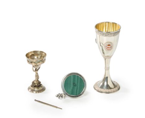 A small group of silverware including a Hanau silver cup. Simon Rosenau. Bad Kissingen, late 19th/early 20th century. Designe
