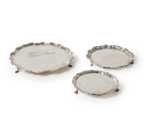 Three silver salvers. Various dates and makers. The group comprising: a shaped, circular salver by Mappin & Webb, Sheffield, 