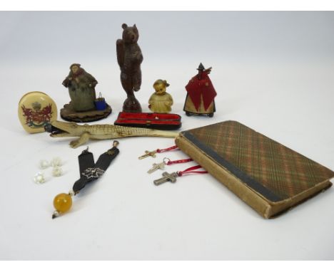 VINTAGE COLLECTABLES GROUP to include a carved Black Forest type bear, two small naively fashioned doll figurines, three nove