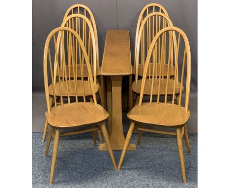 ERCOL LIGHT ELM DROP-LEAF DINING TABLE and six high hoop stick back chairs, labels attached to some, 72cms H, 130cms L, 22cms