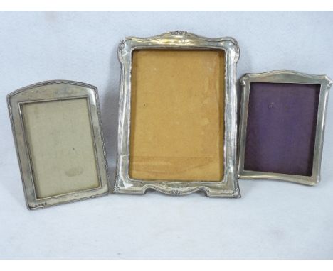 SILVER MOUNTED PORTRAIT FRAMES (3) - Birmingham hallmarks for 1924, 23 x 17cms, 1921 16 x 12cms and 1925 16 x 11cms, various 