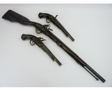 VINTAGE WEAPONS - decorative musket rifle and a decorative pair of pistols