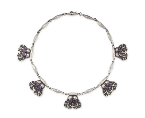 GEORG JENSEN, AN AMETHYST NECKLACE Hammered silver links, suspending five foliate motifs Cabochon amethysts Stamped Georg Jen