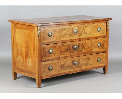 A late 18th century French provincial walnut three-drawer commode with gilt brass mounts, height 83cm, width 131cm, depth 64c