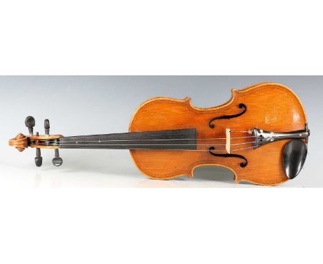 An early 20th century Continental violin with two-piece back, length of back excluding button 35.5cm, cased.