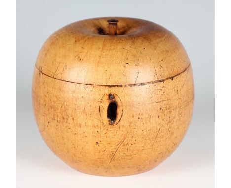 A George III apple tea caddy, finely carved with a stalk finial, with original steel hinge and lock, height 11.5cm (lacking k