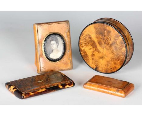 A group of four 19th century snuff boxes, including a mulberry and tortoiseshell snuff box, the interior with applied maker's