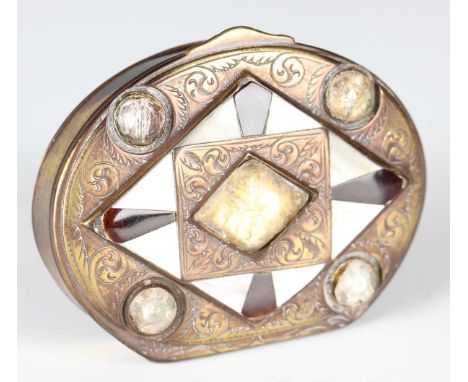 A 17th/18th century brass oval snuff box, the hinged lid inset with glass cabochons and inlaid in mother-of-pearl and tortois