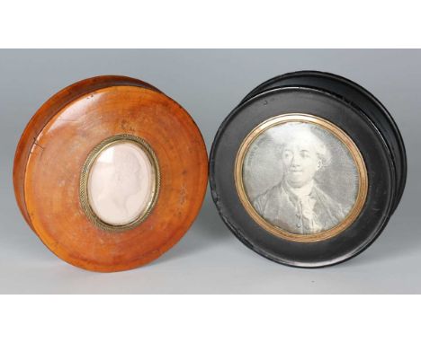 An early 19th century maple circular snuff box, the lid inset with a glazed pink-tinted plaster portrait of a gentleman, diam