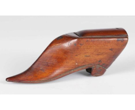 A 19th century mahogany snuff box in the form of a shoe, length 8.5cm.