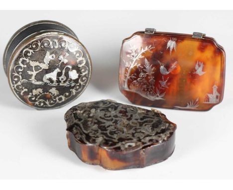 A 19th century tortoiseshell and silver piqué inlaid rectangular snuff box, the hinged lid decorated with an Eastern figure, 