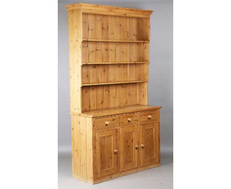 A Victorian style pine kitchen dresser, the shelf back above three drawers and doors, height 245cm, width 147cm, depth 50cm.