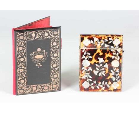 A 19th century gold piqué inlaid aide-mémoire, probably French, the interior lined in red silk, length 12.8cm, together with 
