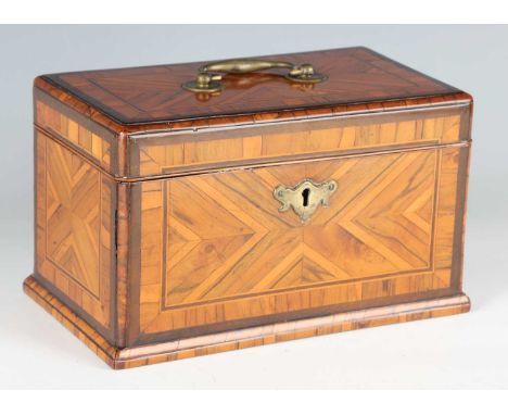 A good George III laburnum tea caddy, the hinged lid and sides quarter and radially veneered, the interior later fitted with 