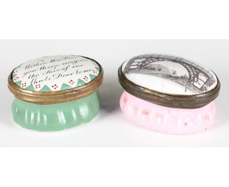 A late 18th century Bilston enamel oval patch box, the lid with transfer printed view, titled 'A Present from the Iron Bridge