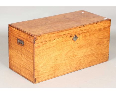A late 19th century polished teak trunk, height 45cm, width 90cm, depth 42cm.