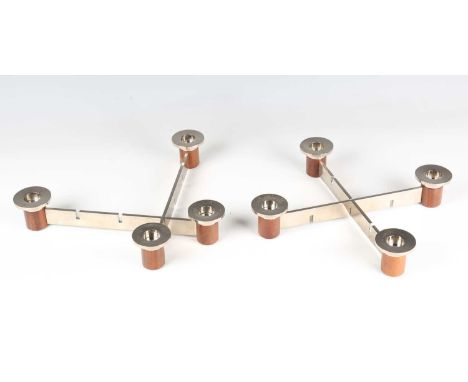 A pair of David Linley chromium plated and wood four-light candelabra, each formed from interfitting cross-piece arms, width 