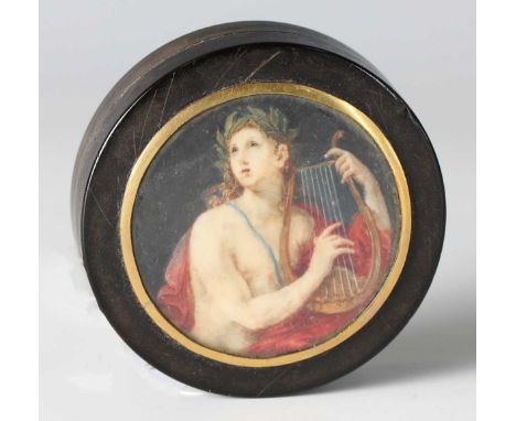 An early 19th century tortoiseshell circular snuff box, the lid inset with a glazed watercolour portrait on ivory of the Gree