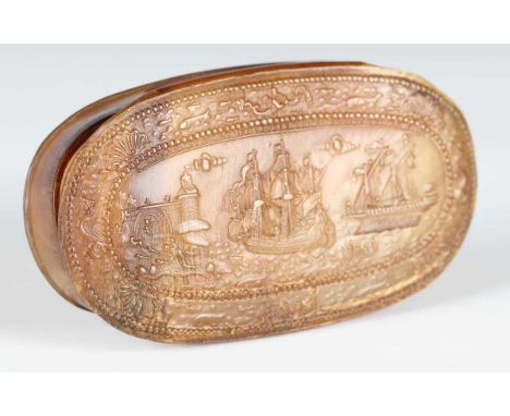 A late 17th century Dutch horn oval snuff box, the removable lid decorated in relief with two ships beside a port, width 12.8